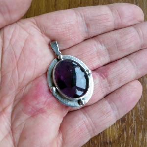 Oval 4 Point Amethyst Pendant in Hallmarked 925 Sterling Silver with Textured Border