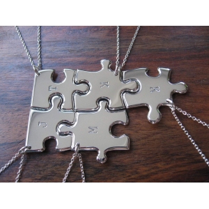 Five Silver Puzzle Necklaces