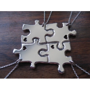 Four Silver Puzzle Necklaces