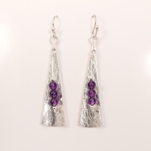 Long dangly silver earrings with beads