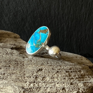 Oval kingman turquoise stone and sterling silver ball open ring