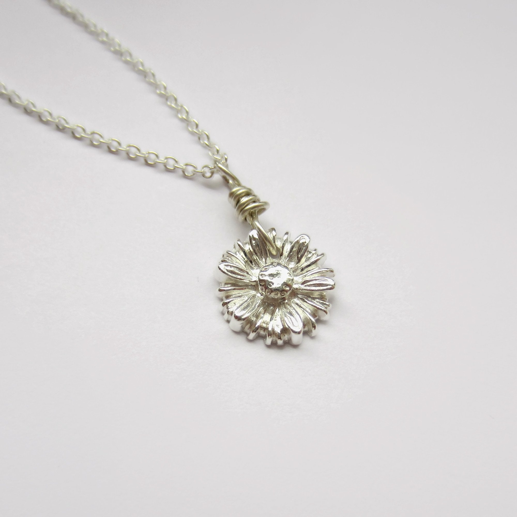 Dainty Argentium Silver Daisy Pendant Necklace - 12mm | The British Craft  House